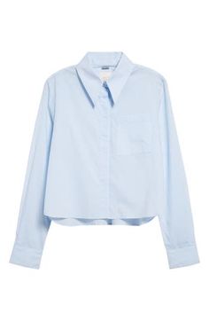 A boxy cotton button-up steps out of the office with a covered button placket and a cute cropped length. 21 1/2" length (size Medium) Front button closure Spread collar Long sleeves with button cuffs Chest patch pocket 100% cotton Dry clean Made in the USA Cotton Cropped Shirt With Button Cuffs, Cropped Cotton Workwear Shirt, Cotton Cropped Shirt With Button Cuffs For Spring, Blue Collared Cropped Shirt For Work, Cotton Cropped Shirt With Buttons For Daywear, Collared Cropped Shirt With Relaxed Fit For Work, Chic Cropped Cotton Shirt, Collared Cotton Cropped Shirt With Buttons, Cotton Collared Cropped Shirt With Buttons