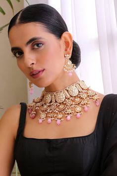 Gold toned choker with kundan embellishment and pearl drops. Comes with earrings.
Components: 1 Necklace, Pair of Earrings
Type: Kundan, pearl
Composition: Brass
Color: Pink
Handmade
Dimensions (inches)L x W: 14 x 15
Weight (gms): 490 - Aza Fashions Jewellery Kundan, Pink Jewelry Set, Choker Jewellery, Choker Set, Jewelry Choker, Fashion App, Jewellery Set, Jewellery Sets, Magic The Gathering