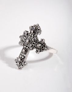 Description
This vintage-inspired statement ring is sure to make you feel like you're from a better era. This ring is made from antique silver and features a diamante-embellished cross. Pair with an evening dress for a considered look. Paint On Clothes, Ring With Cross, Piercings Nose, Sterling Silver Opal Ring, Pastel Goth Outfits, Goth Accessories, Fashion Jewellery Online, Silver Opal Ring, Nose Piercings