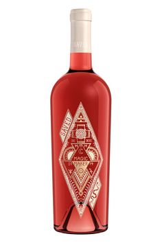 a bottle of red wine with an intricate design on the top and bottom half, in front of a white background