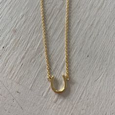 Horseshoe necklace in 14 karat gold plated over sterling silver. Length: 16-18 inch Wearing a horseshoe is about bringing good luck. College Needs, Horseshoe Necklace, Dainty Necklace, Good Luck, Necklace Etsy, Jewelry Necklace Pendant, Pendant Necklaces, 18k Gold, Gold Necklace