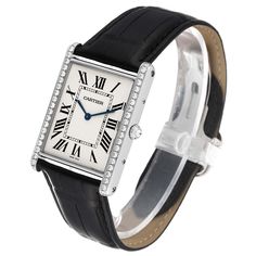 Cartier Tank Louis XL 18k White Gold Diamond Mens Watch WT200006. Manual-winding movement. 18k white gold case 40.4 mm x 34.92 mm with a row of diamonds on the sides. Circular grained crown set with faceted diamond. . Mineral glass crystal. Silvered grained dial. Painted black roman numerals. Sword shaped blued steel hands. Secret Cartier signature at VII. Black alligator strap with the 18k white gold deployant buckle. Cartier Timeless Rectangular Dial Watch, Classic Cartier Watch With Rectangular Dial, Cartier Anniversary Watch With Rectangular Dial, Cartier Timeless Watch Bands With Rectangular Dial, Cartier Watch With Rectangular Dial For Anniversary, Timeless Cartier Watch Bands With Rectangular Dial, Cartier Rectangular Dial Business Watch, Cartier Watches With Diamond Hour Markers For Anniversary, Luxury Business Diamond Watch With Chronometer