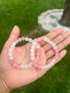 White glass beads with pink glass beads beaded bracelet Adjustable Pink Gemstone Beaded Bracelets, Pink Rose Quartz Round Stretch Bracelet, Pink Rose Quartz Stretch Bracelet, Pink Gemstone Beaded Bracelets As Gift, Pink Rose Quartz Round Beaded Bracelets, Pink Gemstone Beaded Bracelets For Gift, Pink Rose Quartz Stretch Bracelet With 8mm Beads, Adjustable Pink Stretch Bracelet With Gemstone Beads, Adjustable Pink Gemstone Bead Stretch Bracelet