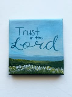 a painting that says trust in the lord