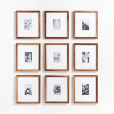 six square wooden frames hanging on the wall