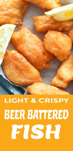 fish and chips on a plate with lemon wedges next to the words light & crispy beer battered fish