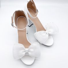 "These Classic Bow Shoe Clips can be worn on the front, back or side of most heels. Listing is for one pair. Shoes not included. *Bows need to be fluffed upon arrival. *Bows can not be worn side by side because they are too wide. - 1 pair - 5\" wide - Made in the USA SHOP MORE SHOE CLIPS, https://www.etsy.com/shop/melissavelia?section_id=24145024 *Although clips are gentle and cushioned, each shoe fabric is different. Please test out the clips on your shoes before leaving them on for a long period of time. We are not responsible for any indentation." White Sandals With 4-inch Heel For Prom, White Heels With Bow And Open Heel, White Open Heel Heels With Bow, White High Heel Block Heels For Prom, White Sandals With Bow And Open Heel, Summer Bridal Shower Block Heel Shoes, White Low Heel Prom Heels, White Open Heel Sandals With Bow, Spring Bridal Shower Block Heel Shoes