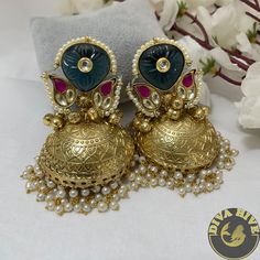 Metal: Brass with 92.5 silver polish with Semi Precious Clear Stone Polish: Silver Length: Short Perfect for all occasions Festive Temple Jewelry Jhumkas For Party, Fusion Style Chandbali Jhumkas For Party, Temple Jewelry Style Jhumkas With Latkans For Party, Fusion Style Chandbalis With Latkans For Party, Fusion Kundan Jhumkas For Party, Fusion Style Kundan Jhumkas For Party, Fusion Style Jhumkas With Latkans For Celebration, Festive Jhumkas With Latkans For Celebration, Fusion Style Jhumkas For Diwali Party