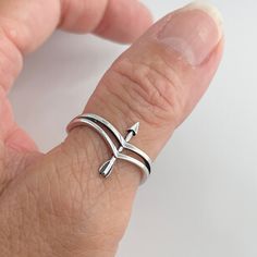 *  Sterling Silver Bow and Arrow Ring, Boho Ring, Silver Ring, Love Ring, Statement Ring, Religious Ring, Bow Ring, Arrow Ring, 925 Stamped *  A bow and arrow can symbolize strength and power, or a sense of direction: You're moving forward without looking back. The arrow has many symbolic meanings, ranging from masculine *  Perfect gift idea for any occasion: birthday, anniversary, engagement, graduation, bridesmaid, Mother's Day, Valentine's Day, Christmas, promise. *  Your purchase includes a Bow And Arrow Ring, Symbolic Adjustable Stackable Open Rings, Adjustable Symbolic Midi Rings For Promise, Symbolic Adjustable Stackable Promise Rings, Adjustable Symbolic Stackable Rings As Gift, Adjustable Symbolic Stackable Rings For Gift, Adjustable Symbolic Midi Rings As Gift, Silver Bow And Arrow, Arrow And Bow