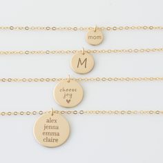 "CLASSIC GOLD DISC NECKLACE Choose your disc size! Our engraved disc necklaces come in 4 sizes, mini 3/8\", small 1/2\", medium 5/8\"or large 3/4\". Engraved and hand assembled with care and love, it comes in 14k gold fill, rose gold fill, or sterling silver. Perfect for layering with our bar necklaces and dainty stone necklaces. * Listing is for one disc necklace, your choice of size HOW - TO - ORDER 1. Select your options from the drop down menu see photo for font styles and symbol options 2. Customizable Gold Round Disc Charm Necklaces, Customizable Gold Round Disc Charm Necklace, Customizable Gold Round Disc Necklace, Customizable Gold Round Disc Jewelry, Yellow Gold Round Disc Jewelry For Mother's Day, Mother's Day Yellow Gold Round Disc Jewelry, Gold Engraved Round Disc Charm Necklace, 14k Gold Name Necklace With Round Shape, Mother's Day Hand Stamped 14k Gold Necklace