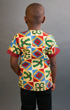 This short sleeved African Kente shirt is real cute. Dress him up in this cute African outfit and he will attract a lot of attention and draw tons of compliments. He can wear it whenever he wants to project his African Identity. He can wear it during Sankofa, Kwanzaa, and any African American or Afrocentric Cultural event. *Hand Sewn African Dress *Made by Local Artisans in Africa *100% Cotton *Made in Ghana *Portions of proceeds donated to charities in Africa *Everything in stock is available i Traditional Printed Yellow Tops, Cute Cotton Tops With Pattern, Cute Cotton Patterned Tops, Multicolor Short Sleeve Tops For Summer, Cute Patterned Cotton Tops, Patterned Cotton Short Sleeve T-shirt, Casual Multicolor Patchwork T-shirt, Casual Multicolor Print T-shirt With Colorful Pattern, Casual Multicolor Print T-shirt