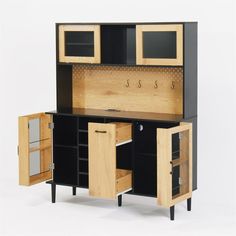 a black and oak kitchen cabinet with drawers