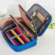 1PCS Multi-function Pencil Bag 72 Slot Large Capacity Painting Pen Holder Storage Box Zipper Bag Gadget Stationery Supplies NEW SPECIFICATIONS Novelty: No Category: Pencil Bag Use: Schools & Offices Type: pencil case Features: Exquisite workmanship and sturdy zippers enhance style, elegance and durability. Compact pen case for maximum storage space. The handle can carry colored pencils anytime, anywhere. The internal zip pocket is wide and suitable for sharpeners, erasers, cables and other gadgets. This pen holder has three layers, two of which are detachable and equipped with a powerful Velcro for organizing colored pencils. The 72 stretchable rings are the best solution for organizing all colored pencils, pens and painting materials. Size: 9.3" x 6.5" x 2.8 Material: Oxford (23.5 cm x 16 Back To School Pencil-shaped Organizer With Zipper, Pencil Shaped Pencil Case With Zipper For Organization, School Pencil Case With Zipper Closure, Back To School Stationery With Zipper Closure, Multifunctional Pencil Case With Pen Slots, Multifunctional Pencil Case With Pen Holders, Back To School Zipper Pouch Organizer, Multifunctional Portable Pencil Case, Back To School Pencil Organizer With Zipper Pouch