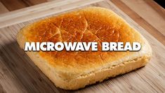 a close up of bread on a cutting board with the words microwave bread over it