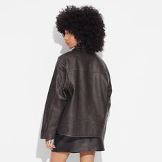 Oversized bomber jacket from Wild Fable™ in dark brown. Made with heavyweight faux leather and soft lining for comfortable wear. Tailored in a long-length silhouette. Designed with a collared neckline, full-length zippered front, long sleeves and waist pockets. If you’re not satisfied with any Target Owned Brand item, return it within one year with a receipt for an exchange or a refund. Wild Fable™: A look for every story. Casual Oversized Faux Leather Outerwear, Chic Oversized Faux Leather Outerwear, Oversize Brown Leather Jacket, Oversized Brown Leather Outerwear, Black Faux Leather Button-up Outerwear, Racing Jacket, Woman Weaving, Wild Fable, Faux Leather Fabric