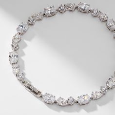 Glam up your wrist with this glistening mixed stone cubic zirconia line bracelet. ABOUT THE PRODUCT: Metal: Brass Plating: Rhodium Stones: Cubic Zirconia Length: 7.25in Nadri Jewelry, Brass Color, Fine Jewellery Earrings, Ring Bracelet, Earring Necklace, Anklets, Diamond Bracelet, Jewelry Sales, Necklaces Bracelets