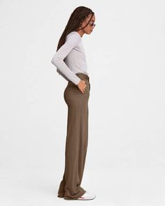 An ultra-modern reimagining of officewear, remixed with home-officewear-level comfort. The Studio Jersey Pant is a wide leg, pull-on knit rib pant crafted from our unbelievably soft signature jersey. rag & bone Women's Slim Fit Pants | Warm Taupe, Large (also in XXS,XS,S,M)