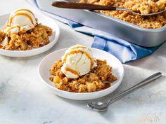 two white bowls filled with dessert and ice cream