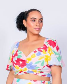 You can't go wrong with a stylish short puff sleeve and ruched center crop top that allows you to complete your look. Pair this plus-size crop top with the matching maxi skirt. LuvMeMore Peaches Puff Sleeve Crop Top | Large Floral | Tops | Materials & Care Instructions: ['100% Viscose', 'Machine wash cold', 'Made in USA'] Cheap Pink Top With Fruit Print, Peach Crop Top, Plus Size Crop Tops, Peach Puff, Summer Tie Dye, Puff Sleeve Crop Top, Short Puff Sleeve, Tie Dye Crop Top, Quirky Art