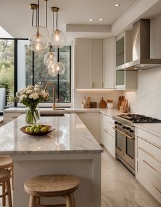 a kitchen filled with lots of white counter top next to a stove top oven and sink