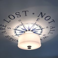 there is a clock on the ceiling in the room that says lost and not here