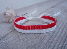 Loom beaded bracelet with Indonesia, Poland or Monaco flag. Patriotic hand woven beaded wristbandt is a great gift for a man women or child for Birthday, Christmas, Valentine's Day and other holidays. Small memorable frienship gift with flag colors for the homesick. Is suitable for daily wear. Bracelet in stock and ready to ship. More bracelets here: https://www.etsy.com/shop/BeadSeeShop?ref=seller-platform-mcnav&section_id=30144819 The bracelet is made of Czech seed beads and strong nylon threa Casual Handwoven Beaded Bracelets As Gift, White Handwoven Bracelets With Round Beads, White Handwoven Bracelets, White Handwoven Beaded Bracelets For Friendship, White Handwoven Adjustable Bracelets, Adjustable White Handwoven Bracelets, Adjustable White Handwoven Beaded Bracelets, Gift Handwoven Braided Bracelets With Round Beads, White Handwoven Beaded Bracelets As Gift