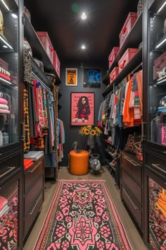 a walk in closet with lots of clothes and rugs