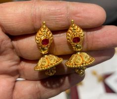 22k Gold Earrings- Real Gold Dangling Jhumka Earrings-Jhumka Earrings- Solid Gold Earrings-Indian Gold Earrings-Rajasthani Gold Stud Jhumkas  This is beautifully handcrafted Indian karigari designed 22k Solid Gold Jhumkas which is designed purely considering the vintage heritage Look design with modern look that gives it eye catchy look ! PRODUCT SPECIFICATIONS:  Material : 22k Solid Gold Weight: 10 gram  approx  Customer satisfaction is our utmost priority, feel free to have any query, would love to assist you!  Jai Shree Shyam🙏🙏 Happy Shopping 🛍️ 22k Gold Chandbali Jhumkas For Festive Occasions, Heavy 22k Gold Earrings For Puja, 22k Gold Tilla Jhumkas For Puja, 22k Gold Jhumkas For Puja And Festive Occasions, 22k Gold Jhumkas With Intricate Design For Puja, 22k Gold Temple Jewelry Bridal Earrings With Latkans, Yellow Gold Jhumkas For Puja, Yellow Gold Tilla Jhumkas For Puja, 22k Gold Chandbalis With Latkans Temple Jewelry