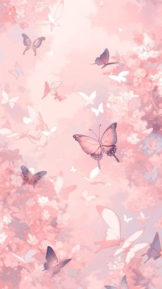 butterflies flying in the sky over pink flowers