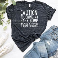 “Caution Touching My Bump Will Result In You Getting Throat Punched” Funny T-Shirt Never Worn - Was A Gift Not In My Size - Just A Few Months Old - Brand New Super Soft Fabric Comment For Measurements - Bundle And Save! Trades Will Be Considered Smoke Free Home! Funny Mom To Be Shirts, Mommy To Be Shirts Ideas, Funny Maternity Shirts, Toddler Board, Baby Shower Shirts, Funny Pregnancy Shirts, Maternity Shirts, To My Love, Tale As Old As Time