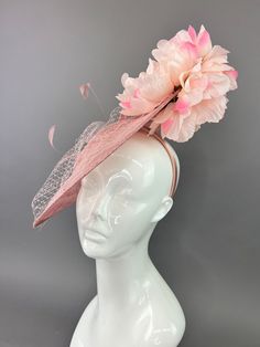 Blush pink sinamay fascinator adorned with two shades of pink blooms. made to be worn on the right side. Fascinators are one size fits all. All Sales are final. don’t forget to follow us on instagram @TheHatHive Pink Fascinator For Spring Wedding, Pink Spring Wedding Headpieces, Pink Wedding Headpieces For Spring, Pink Headband Fascinator For Races, Pink Evening Fascinator Headband, Pink Headband Fascinator For Evening, Pink Headband Fascinator For Summer, Pink Spring Headpiece For Races, Pink Headpieces With Handmade Flowers For Royal Ascot