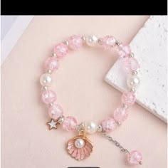 Pink Crystal Bracelet With Sea Shell Baby Pink Evil Eye Bracelet, Affordable Beaded Kawaii Bracelets, Preppy Beaded Bracelet Pink, Preppy Make Bracelet Aesthet, Affordable Pink Pearl Bracelet With Round Beads, Pastel Preppy Bracelet, Cutes Bracelets, Princess Bracelet, Kawaii Bracelet