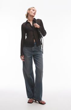 Feel the polish and charm of this sheer chiffon shirt textured in fine allover pleats. Front button closure Spread collar Long sleeves Sheer; base layer shown not included 100% polyester Machine wash, line dry Imported Sheer T Shirt Outfit, Sheer Black Button Up, Sheer Top Styling, Sheer Button Down, Fitted Button Up, Sheer Blouse Outfit, Sheer Shirt Outfits, Fall 24, Sheer Shirt