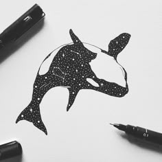 a drawing of a whale with dots on it