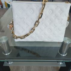 Purse, White, Like New, Comes With Black Lv Wallet. Never Used Or Out In Public. Have All Reciepts From Lv Store. Luxury White Clutch With Chain Strap, Luxury White Clutch With Detachable Strap, Luxury White Clutch With Gold-tone Hardware, Luxury Clutch With Chain Strap For Shopping, Lv Store, Lv Shoulder Bag, Louis Vuitton Tivoli, Louis Vuitton Pochette Metis, Louis Vuitton Limited Edition