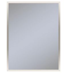 a white framed mirror on a wall