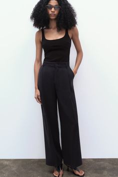 FLOWY PLEATED PANTS - Black | ZARA United States Zara Business Casual Pants With Belt Loops, Trendy Dress Pants With Belt Loops, Trendy Straight Dress Pants With Belt Loops, Zara Pants With Welt Pockets For Work, Trendy Pants With Belt Loops For Work, Zara Wide Leg Pants For Office, Chic Zara Pants With Belt Loops, Zara High Waist Pants With Belt Loops, Zara Wide-leg Dress Pants With Pockets