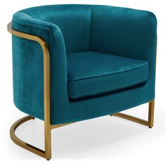 a blue velvet chair with gold legs