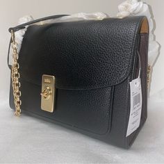 Coach Lane Shoulder Bag New With Original Packaging 100 % Authentic Black Multi With Gold Hardware Refined Pebble Leather Snake-Embossed Leather Inside Multifunction Pocket Center Zip Compartment Turnlock Closure Outside Open Pocket Handles (Convertible) To Shoulder Strap With 19 1/4" Drop Approximate Measurements 10 1/4" L X 7" H X 4" W Elegant Flap Bag With Branded Hardware For Work, Elegant Workwear Flap Bag With Branded Hardware, Designer Bags With Turn-lock Closure, Luxury Coach Shoulder Bag For Work, Elegant Coach Shoulder Bag For Work, Luxury Workwear Satchel With Branded Hardware, Coach Satchel With Gold-tone Hardware For Work, Coach Bags With Metal Hardware For Work, Designer Office Bags With Turn-lock Closure