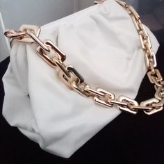 The Chain Pouch Brand New Item Gold Hardware Color: Ivory Gold Shoulder Bag Clutch With Chain, Gold Shoulder Clutch With Chain, White Shoulder Bag With Chain For Everyday, White Chain Shoulder Bag For Everyday Use, White Bag With Chain Strap, Elegant Gold Chain Link Shoulder Bag, White Party Bag With Chain, White Bags With Gold Chain For Everyday Use, White Bag With Gold Chain For Everyday Use