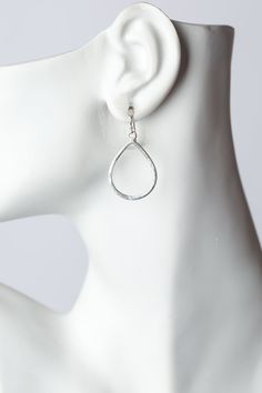 The brushed silver findings in a simple teardrop design. They are created with brushed silver plated brass, and dangle at approximately 1.5" from sterling silver ear wires. Silver Plated Brass (nickel and lead-safe) 1.5", with sterling silver ear wires We hand select our natural materials, thus there may be slight variations in color and/or size that will not detract from the overall aesthetic Our unique handcrafted designer jewelry for women is made in America, each design created individually Modern Nickel-free Teardrop Earrings, Metal Teardrop Earrings With Lever Back, Metal Teardrop Earrings With French Hook, Silver Metal Teardrop Earrings For Everyday, Modern Silver Teardrop Earrings, Silver Teardrop Everyday Earrings, Everyday Silver Teardrop Metal Earrings, Everyday Silver Teardrop Earrings, Silver Metal Teardrop Pendant Earrings