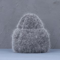 Stay warm and comfortable in style with the Classic Knitted Winter Beanie. Made from soft, cozy knit fabric, this beanie features a ribbed texture that offers a snug fit for all-day wear. The clean, minimalist design in white makes it a versatile accessory for any winter outfit. Ideal for casual outings or chilly days, this beanie will keep you warm all season long. Specifications: Pattern Type: Solid Material: Wool Fur & Cashmere Feature: Keep warm Applicable Season: Winter Style: Casual Size: Solid Color Soft Knit Crochet Cap, Cozy Knit Ribbed Beanie, Cozy Ribbed Knit Beanie, Cozy Soft Hats For Cold Weather, Cozy Soft Solid Beanie, Cozy Soft Solid Color Beanie, Cozy Soft Beanie One Size, Cozy Soft One-size Beanie, Cozy One Size Soft Beanie