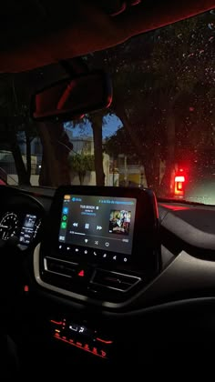 the interior of a car with an entertainment system on display in the center console and dashboard