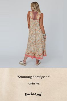 Whether you're dressing up for a special event or just want to add some boho flair to your everyday look, the Paradise Sunrise Maxi Dress is sure to make a statement! Lightweight, flowy, woven fabric with an eye - catching floral print Flattering empire maxi dress silhouette Square neckline and backline with thick shoulder straps Gathered tiers for added boho style Bottom hem with so pretty floral border print Pair with: Eye Of The Sun Padded Bralette, Sunlit Sands Panama Hat and Turquoise Casca Beige Flowy Maxi Dress For Spring, Flowy Printed Midi Dress For Garden Party, Flowy Boho Dress With Boho Print For Brunch, Flowy Boho Print Dress For Spring, Spring Boho Print Flowy Dress, Flowy Maxi Dress For Spring And Summer, Spring Boho Dress With Floral Print For Garden Party, Bohemian Sleeveless Sundress For Brunch, Flowy Boho Dress For Spring Garden Party