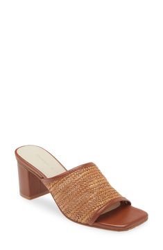 Woven raffia adds boho charm to a slide sandal balanced by a squared-off toe and wrapped block heel. 2 3/4" heel Cushioned footbed Synthetic and leather upper/leather lining/rubber sole Imported Summer Mules With Wooden Block Heel, Summer Vacation Mules With Square Toe, Chic Vacation Mules With Wooden Heel, Chic Mules With Wooden Heel For Vacation, Beach Sandals With Stacked Block Heel, Brown Sandals With Stacked Heel And Square Toe, Chic Beach Mules With Block Heel, Vacation Heels With Stacked Block Heel, Casual Beach Sandals With Sculpted Heel