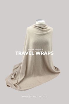 This cashmere wrap is both fashionable and practical for travel. Dark Beige