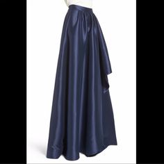 This Waist-Narrowing Ball Skirt With Satin Shine Elegantly Drapes For A Very Flattering Look - Side Zip Closure - Side-Seam Pockets - Lined - 100% Polyester - Dry Clean Chic Blue A-line Maxi Skirt, Blue Fitted A-line Maxi Skirt, Blue A-line Maxi Skirt With Lining, Evening Draped Tiered Skirt With Pleats, Formal Tiered Ruffled Maxi Skirt, Evening Asymmetrical Gathered Maxi Skirt, Formal Asymmetrical Draped Ruffled Skirt, Blue Pleated Flared Maxi Skirt, Evening Draped Skirt With Ruffled Flare