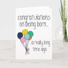 congratulationss on being born a really long time ago card with balloons in the air