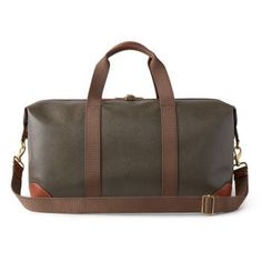 Nothing says 'classic Mulberry' like our Scotchgrain luggage collection. Its beautifully textured surface is accented by smooth leather trim. Travel pieces should be built to last, and look good while doing it. A timeless travel bag in a medium size, this clipper has two short handles and a detachable shoulder strap. Leather trim detailing Two canvas handles with leather detailing Detachable and adjustable canvas shoulder strap Metal feet at the base of bag Detachable luggage tag Internal Mulber Classic Bags With Leather Trim And Epsom Leather, Classic Bags With Epsom Leather And Leather Trim, Classic Epsom Leather Bags With Leather Trim, Classic Brown Saffiano Leather Bag, Classic Epsom Leather Travel Bag, Designer Brown Luggage With Leather Trim, Luxury Brown Coated Canvas Luggage, Designer Brown Luggage With Leather Handles, Classic Coated Canvas Luggage With Sleeve