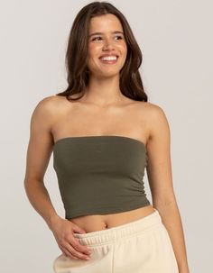 Tilly's Tube Top. Solid Color. Sleeveless. Cropped Fit. 60% Cotton, 36% Rayon, 5% Spandex. Machine Wash. Imported. Model Is Wearing A Size Small. Model Measurements:height: 5'8" Bust: 34"waist: 24"hips: 35" | Tillys Tube Top Casual Tube Top With Built-in Bra, Seamless Sleeveless Tube Top For Spring, Seamless Sleeveless Spring Tube Top, Casual Strapless Camisole With Built-in Bra, Stretch Tank Tube Top For Summer, Summer Stretch Tank Tube Top, Seamless Stretch Sleeveless Tube Top, Seamless Bandeau Tank Top For Summer, Green Sleeveless Tube Top With Built-in Bra